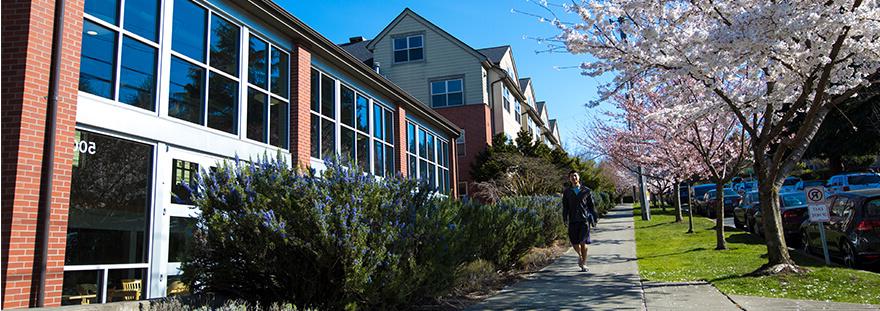 student walking near Emerson Hall